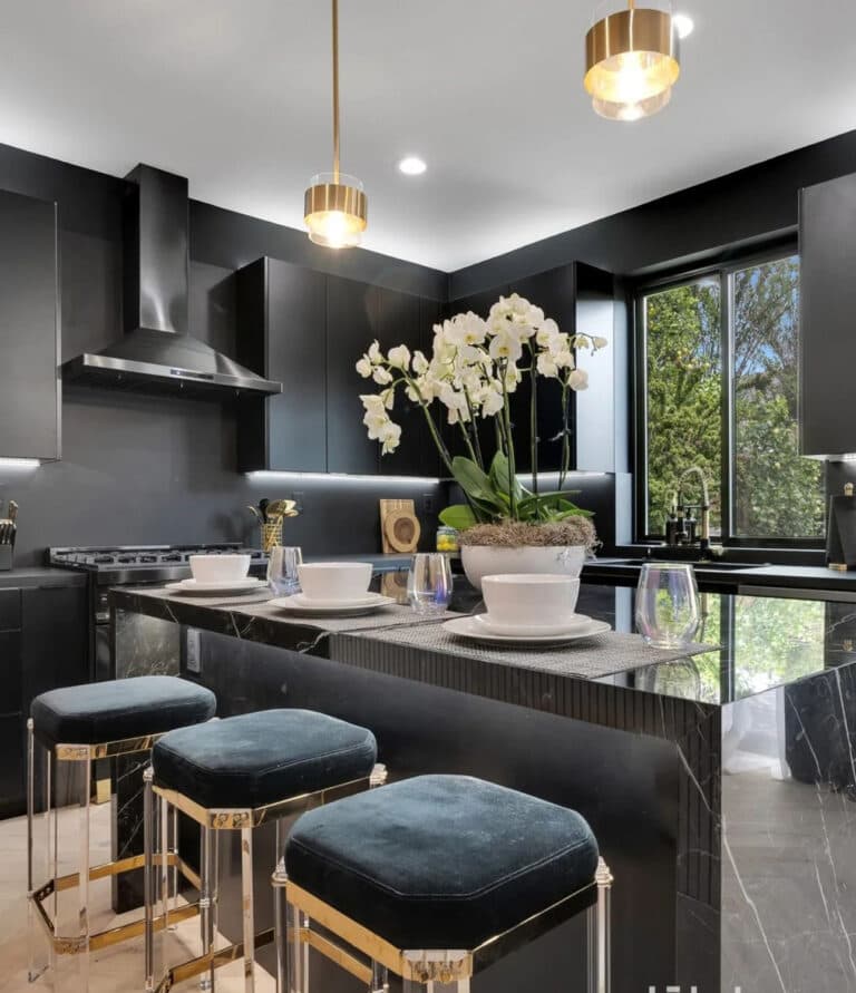 Modern kitchen remodel by IAS Boutique Remodeling in Houston featuring custom cabinetry and pendant lighting.